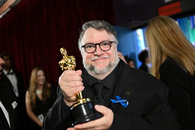 Guillermo del Toro na 95. podelitvi oskarjev. FOTO: A.m.p.a.s/Reuters