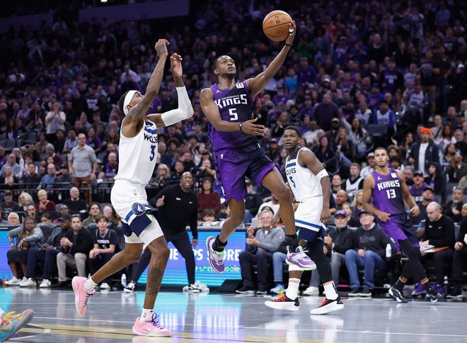 De'Aaron Fox je imel svoj večer, a 60 točk je bilo premalo za zmago Sacramenta. FOTO: Lachlan Cunningham/AFP