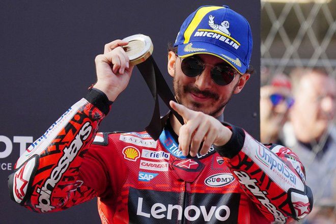 Francesco Bagnaia se je takole veselil zmage v šprintu. FOTO: Manaure Quintero/AFP