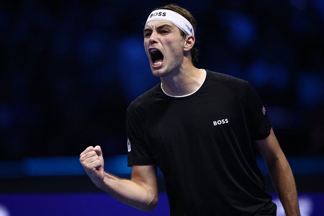 Taylor Fritz se je takole veselil zmage v polfinalu Torina. FOTO: Guglielmo Mangiapane/Reuters