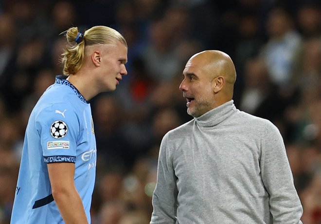 Kaže, da bosta Erling Haaland in Pep Guardiola nadaljevala sodelovanje. FOTO: Molly Darlington/Reuters