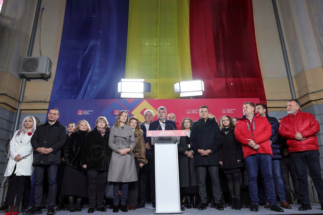 Romunski premier in nekdanji vodja romunske socialdemokratske stranke Marcel Ciolacu v Bukarešti med nagovorom po objavi prvih rezultatov parlamentarnih volitev FOTO: Inquam Photos/Octav Ganea via Reuters