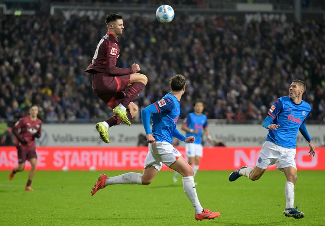 Benjamin Šeško je po pokalni tekmi sredi tedna tokrat v ligi vnovič zadel za Leipzig. FOTO: Fabian Bimmer/AFP