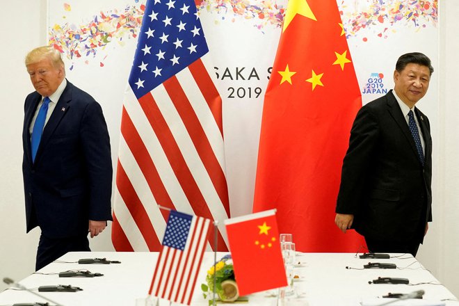 Se bo Xi Jinping odzval vabilu na inavguracijo Donalda Trumpa? FOTO: Kevin Lamarque/Reuters