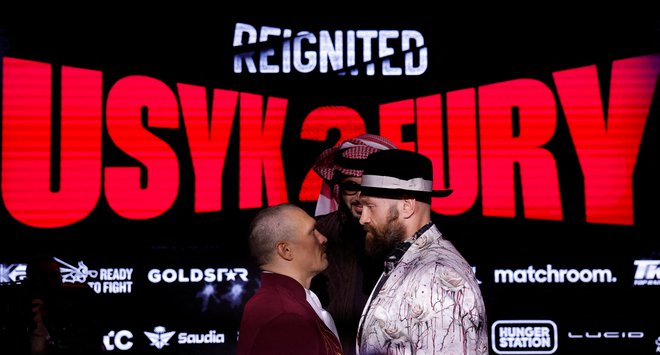 Oleksandr Usik in Tyson Fury napovedujeta novo spektakularno borbo. FOTO: Andrew Couldridge/Reuters