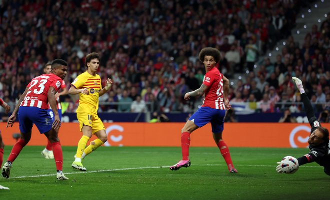 Jan Oblak nima dobrih spominov na Barcelono. FOTO: Isabel Infantes/Reuters