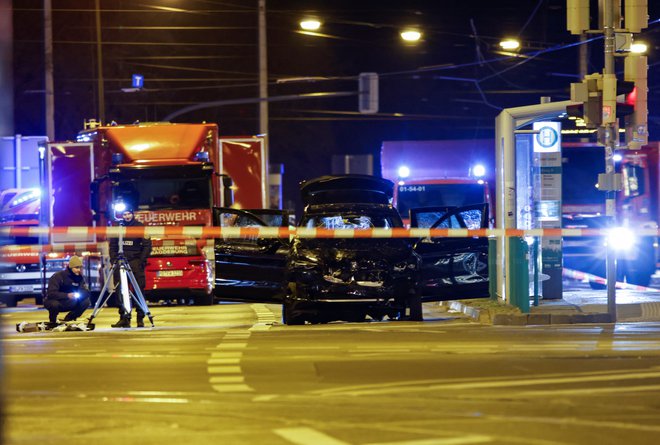 Umrli sta dve osebi. FOTO: Axel Schmidt/Reuters