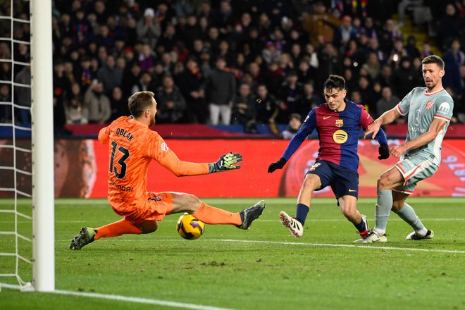 Jan Oblak je spet blestel v vratih Atletica. FOTO: Josep Lago/AFP