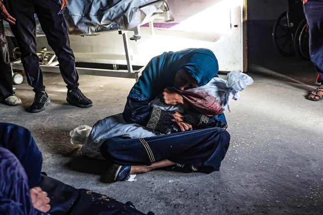 Genocid je v Gazi zaradi popolne impotence usedlin mednarodne skupnosti postal nekaj samoumevnega, globalno politično sprejemljivega. FOTO: Eyad Baba/Afp