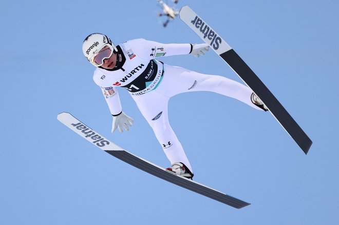 Anže Lanišek bo po doslej prikazanem glavni slovenski adut tudi na 73. novoletni turneji. FOTO: Geir Olsen/Reuters