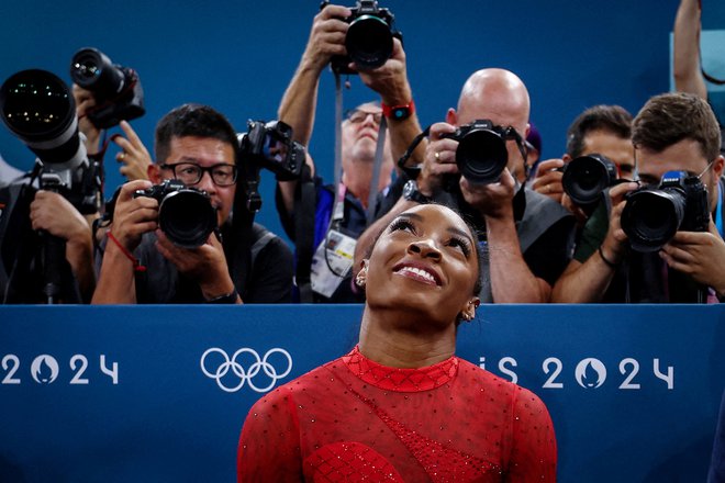 Simone Biles že dolgo blesti v svetu gimnastike. FOTO: Hannah Mckay/Reuters