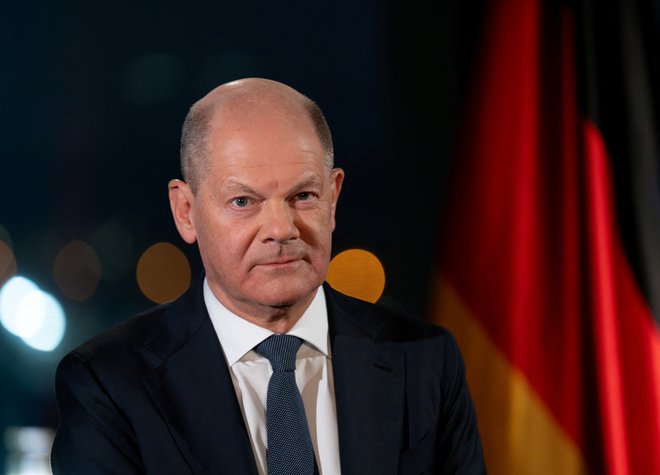 Kancler Olaf Scholz je v svojem nagovoru poudaril, da je Nemčija kljub gospodarskim težavam in vse višjim življenjskim stroškom še vedno tretje največje gospodarstvo na svetu. FOTO: Soeren Stache/Reuters