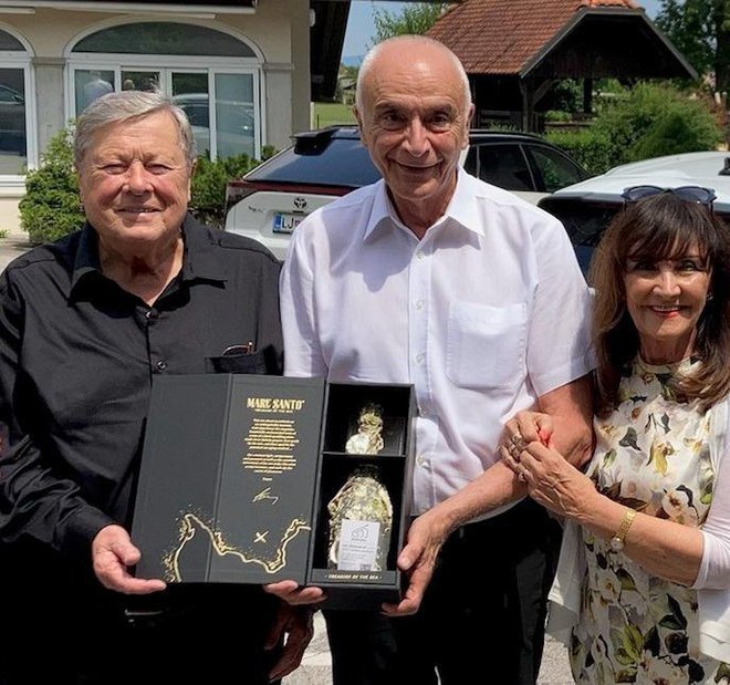 Ivo Boscarol in Metka Zorc z Melanijim očetom. FOTO: Osebni arhiv