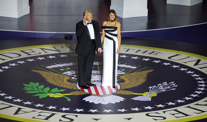 Donald in Melania Trump. FOTO: Carlos Barria/Reuters