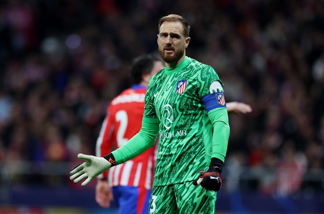 Jan Oblak se je pri Atleticu veselil pomembne zmage. FOTO: Isabel Infantes/Reuters