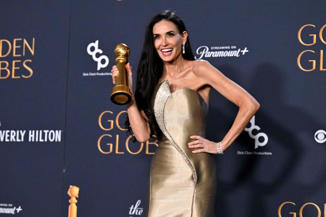 Bo Demi Moore 2. marca v rokah držala tudi oskarja? FOTO: Robyn Beck/AFP