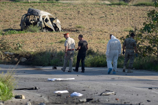 Avtomobil je bil popolnoma uničen. FOTO: AFP