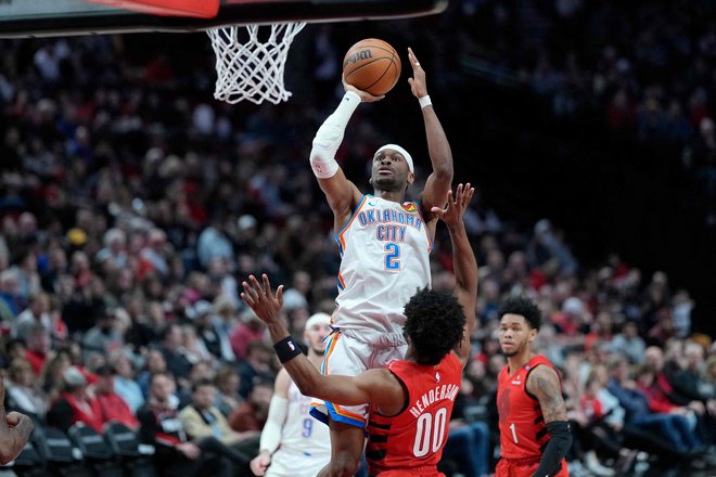 Kanadski zvezdnik Shai Gilgeous-Alexander je bil znova izjemno razpoložen. FOTO: Soobum Im/AFP