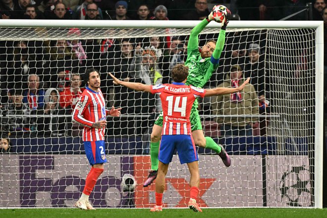 Jan Oblak bo edini Slovenec v osmini finala lige prvakov, če bo Atletico osvojil vsaj točko v Salzburgu. Foto Javier Soriano/AFP