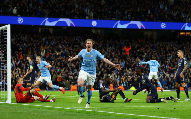 Kevin De Bruyne je lani dosegel gol proti Real Madridu, ki se je na koncu zadnji smejal. Foto Molly Darlington/Reuters