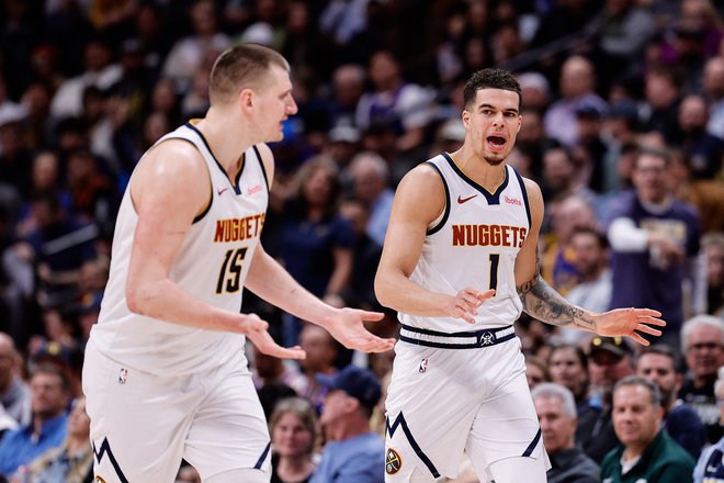 Denverjev dvojec Michael Porter Jr. (desno) in Nikola Jokić je dosegel kar 77 točk za zanesljivo zmago proti New Orleansu. FOTO: Isaiah J. Downing/Usa Today Sports Via Reuters Con