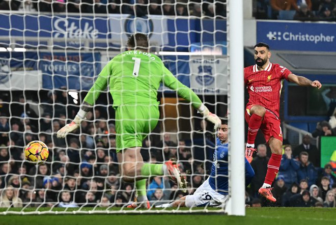 Mohamed Salah je dosegel drugi gol za Liverpool. FOTO: Paul Ellis/AFP