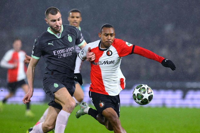 Brazilec Igor Paixao (desno) je bil junak Feyenoordove zmage nad Milanom. FOTO: John Thys/AFP