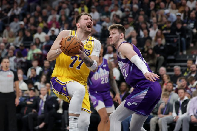 Luka Dončić je imel tokrat slab večer na črti za proste mete, zadel je le enega od petih. FOTO: Chris Nicoll/Reuters