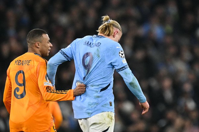 Kylian Mbappe in Erling Haaland sta osrednja napadalca Reala in Manchester Cityja, oba sta zadela na prvi tekmi. FOTO: Oli Scarff /AFP