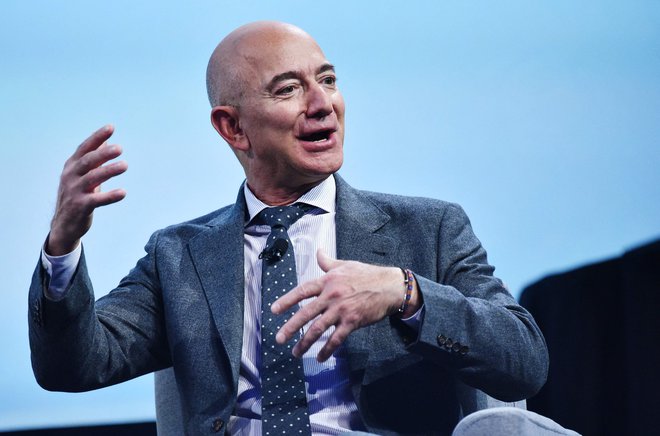 Bezos je Washington Post kupil leta 2013 za 250 milijonov dolarjev. Foto Mandel Ngan/AFP