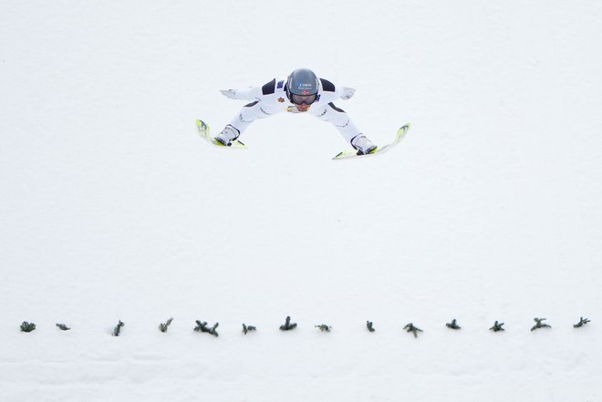 Jarl Magnus Riiber je Norvežane vodil k zlatu. FOTO: Lise Aserud/AFP