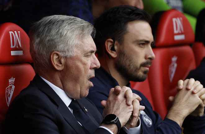 Carlo Ancelotti in njegov sin Davide izjemno uspešno sodelujeta na klopi madridskega Reala. FOTO: Vincent West/Reuters