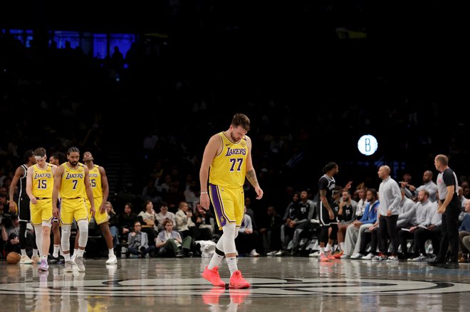 Parket je zapustil s sklonjeno glavo. FOTO: Brad Penner/Reuters