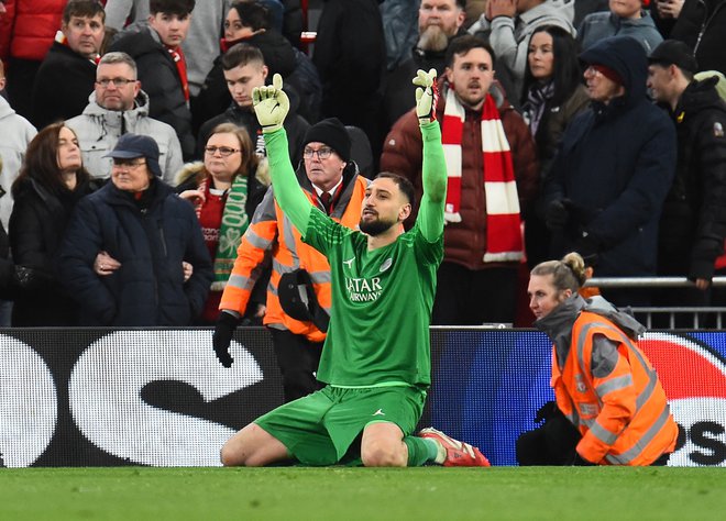 Gianluigi Donnarumma je bil junak Pariza v Liverpoolu. Ubranil je dve enajstmetrovki. FOTO: Peter Powell/Reuters