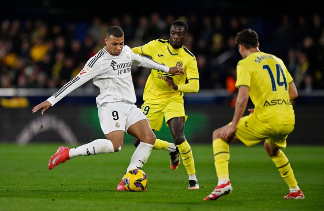 Kylian Mbappe je Real Madridu prinesel zmago na gostovanju pri Villarrealu. FOTO: Pablo Morano/Reuters