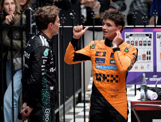 Lando Norris se je takole veselil zmage v Avstraliji. FOTO: Tracey Nearmy/Reuters